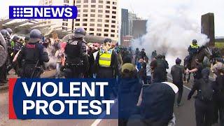 Police injured, dozens arrested after violent anti-war protest | 9 News Australia