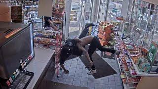 Surveillance video shows Detroit officer ambushed at gas station