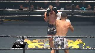 Michael Pham with an amazing head kick and then a spinning elbow from hell!!