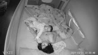 Baby Monitor Captures: Baby trying to find a comfortable position to Sleep