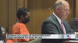 Woman accused of shooting Church's Chicken worker to stay in jail