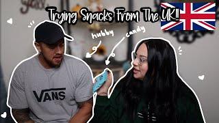 MY HUSBAND AND I TRYING UK SNACKS!! | Collab With Melody Collis