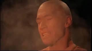 Caine lifts a hot cauldron bare handed for his final test for becoming a Shaolin Priest