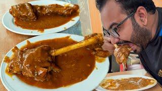 Eating Spicy Mutton Nalli With Butter Naan Roti at Star Kabab & Restaurant