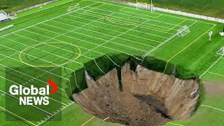 Massive sinkhole swallows Illinois soccer field, drone video shows