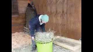 How to load a Handy Hay Net using an inexpensive utility bucket.