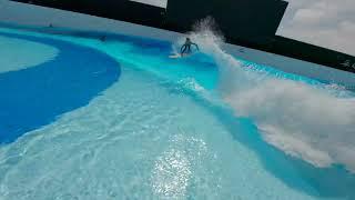 FPV Drone Shot on Rosina Neuerer, surfing a pointbreak in Munich