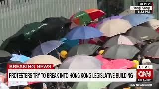 Hong Kong protesters trying to break into government headquarters in major escalation