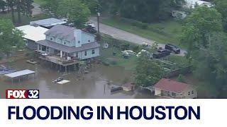 Neighborhoods under water amid record flooding in Houston