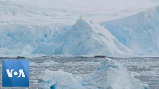 Moment Massive Slab of Ice Breaks Off of Glacier in Antarctica