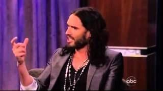 Russell Brand Shooting a Gun - 2012