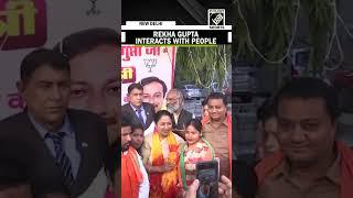 Delhi Chief Minister Rekha Gupta interacts with people at her residence