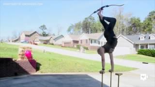 Watch teen shoot bow and arrow with toes