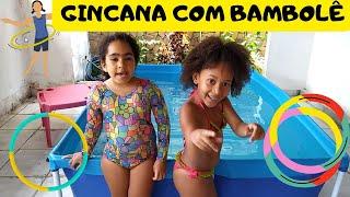 Gincana com bambolê na piscina