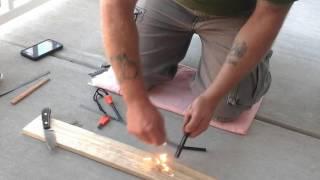 Using a hack saw blade to strike a fero-rod.