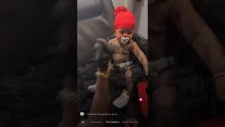 A 3 year old baby boy put on is first body tattoo