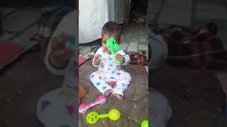 small baby plating with Toys