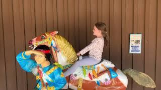 Mya riding mechanical horse Wall drug South Dakota