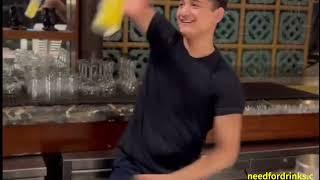 Making A Gin Aroy - While Bartender Doing Flair And Tricks