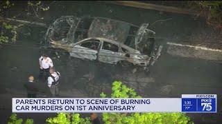 Parents visit burning car murder scene on 1st anniversary