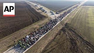 Serbian student protesters march ahead of bridge blockade