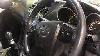 Mazda | CX-9 | OBD port location