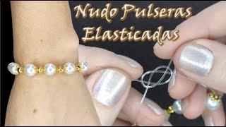 NUDO PARA PULSERA CON ELÁSTICO. Pulsera con perlas y separadores, nudo as de guía.