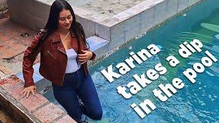 Karina takes a fully clothed dip in the pool (Wetlook)