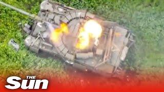 Russian tank is blown to bits by Ukrainian drone strike