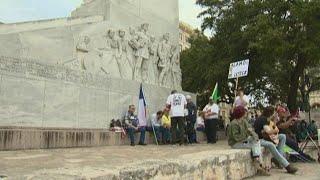 Silent protest staged in front of Alamo amid plans to move Cenotaph