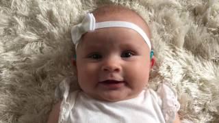 Baby puts on hearing aids for the first time