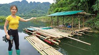 Girl completes frame and roof of bamboo raft house floating on lake - Living Off the Net
