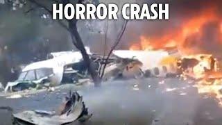 Chilling footage shows plane falling to ground and exploding in horror crash that left 62 dead