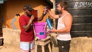 A German tourist in Sierra Leone uses @MSRGear water filter to purify his drinking water