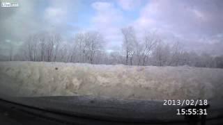 Driver Attempts to Pass on Snow Bank