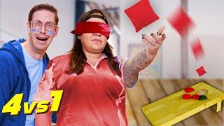 Can 4 Guys Beat a Blindfolded Cornhole Champion?