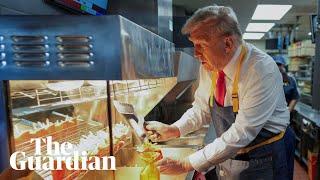 Donald Trump makes fries during staged campaign event at McDonald's