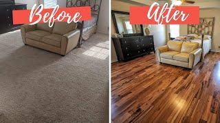 Install flooring in a bedroom full of furniture