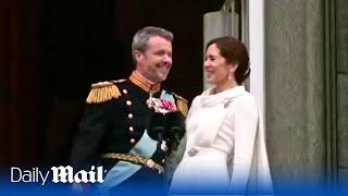 Sealed with a kiss! Denmark's new King Frederik is joined by Queen Mary in balcony appearance