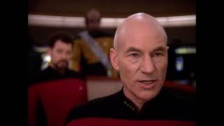 Captain Picard and Commander Tomalak stare at each other across the Neutral Zone