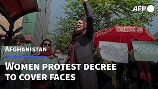 Afghan women protest decree to cover faces | AFP