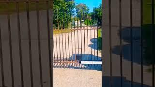 Priming driveway gates with Rust-Oleum rusty metal primer #exteriorpainting