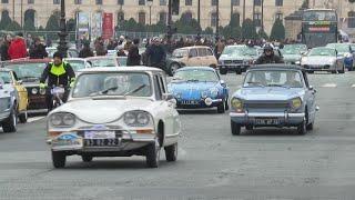 Vintage car enthusiasts take to the streets of Paris | AFP