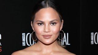 Chrissy Teigen Suffers Nip Slip at Super Bowl and Her Reaction is Everything!
