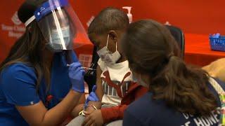 CDC clarifies COVID vaccine guidance, keeping recommendation for healthy children