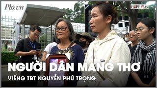 Người dân đi hàng trăm km mang thơ vào viếng Tổng Bí thư Nguyễn Phú Trọng - PLO