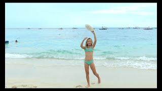 Children playing on the beach 4k. Frisbee.