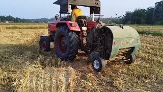 Redlands Round straw Baler working in field. @explorerexpedition.