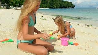 Children playing on the beach 4K