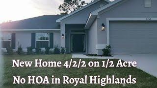 1755 sq ft 4/2/2 on 1/2 acre with no HOA in Royal Highlands!